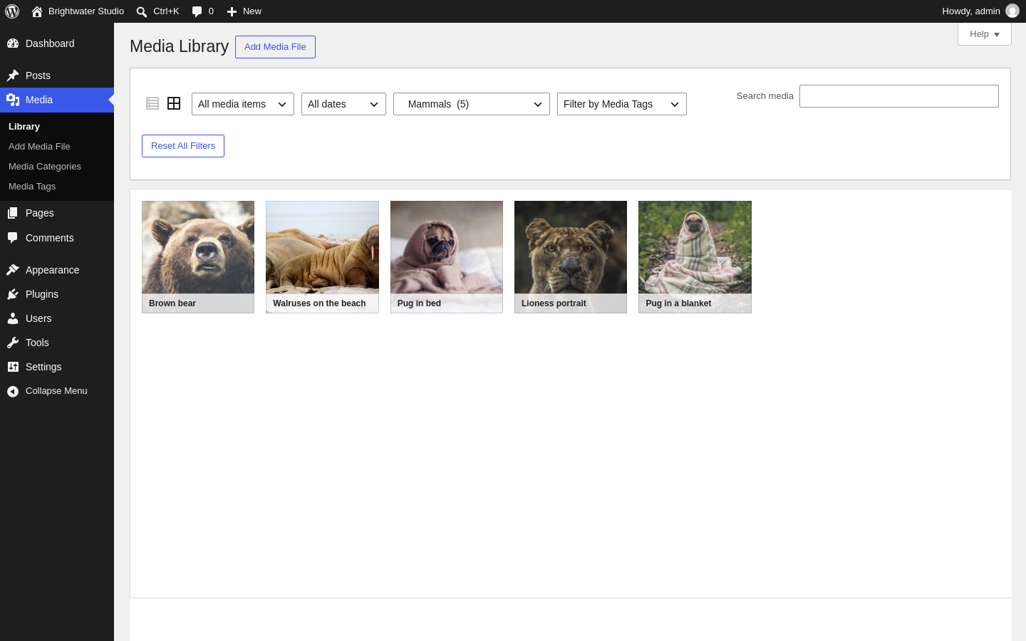 The WordPress media library filtered to the Mammals category, showing five photos, with filters for type, date, category and tag.
