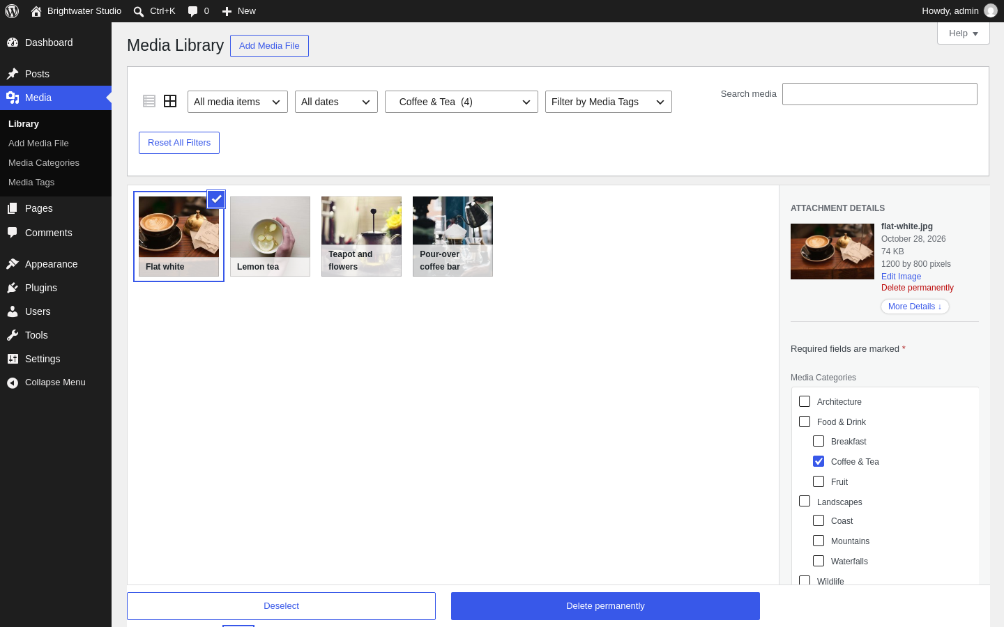 A photo selected in the media grid, with a list of category checkboxes in the details panel.